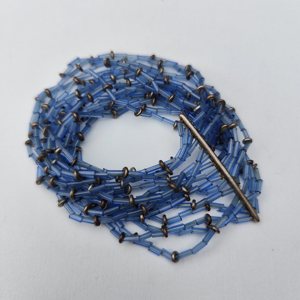 3/$30💜Multi-strand bracelet with blue tube beads and gold tone spacers